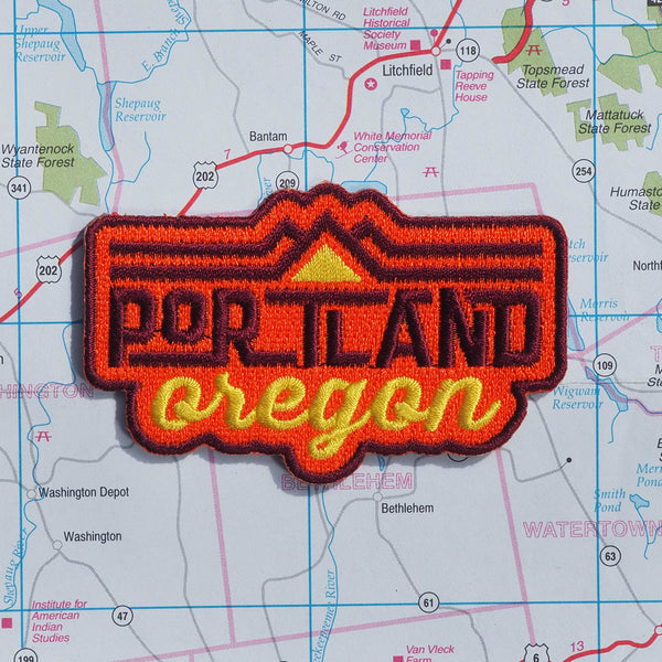 Portland Oregon patch on a map background