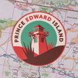 Prince Edward Island sticker featuring a lighthouse design on a colorful map background.