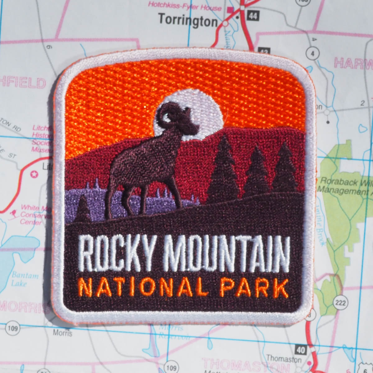 Rocky Mountain patch on a map background