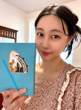 Actual Singapore sticker on a notebook