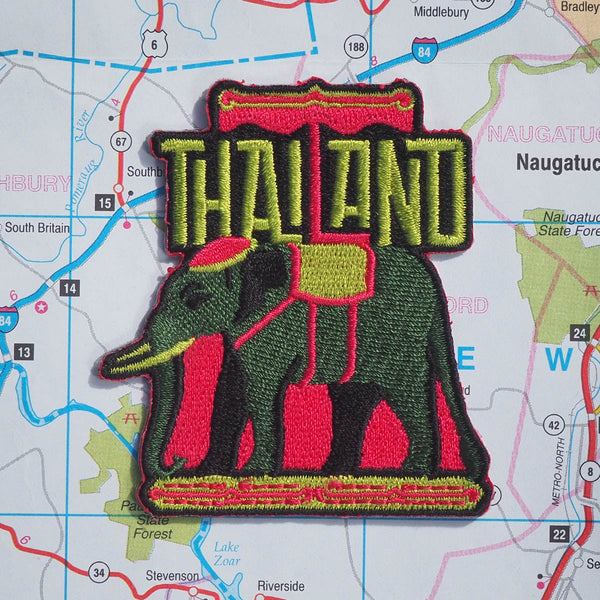 Thailand patch on a map background