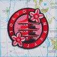 Tokyo patch on a map background