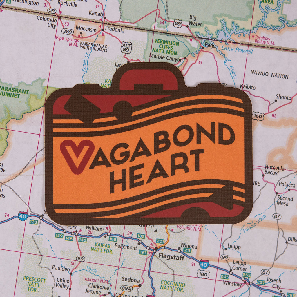 vagabond heart sticker on a map background