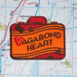 vagabond heart patch on a map background