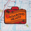 vagabond heart patch on a map background