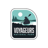 BONUS National Park sticker featuring a silhouette of a kayaker on water with trees and a moon in the background.
